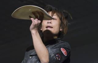 Kazuya Akaogi, 30, of Japan competes in the acrobatic portion of the World Pizza Games, part of the International Pizza Expo, at the Las Vegas Convention Center Wednesday, March 14, 2012.