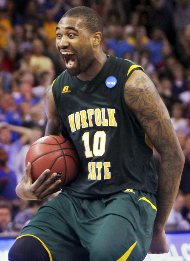 Norfolk State's Kyle O'Quinn celebrates after his team beat Missouri 86-84 in an NCAA tournament second-round college basketball game at CenturyLink Center in Omaha, Neb., on Friday, March 16, 2012.
