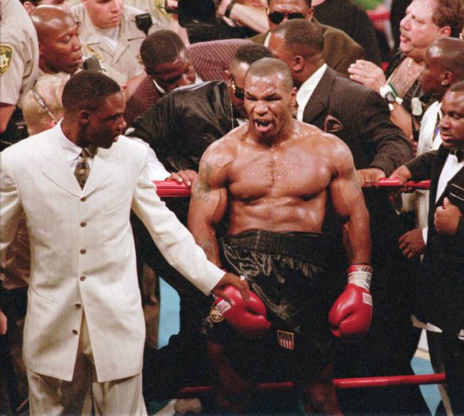 Mike Tyson moments after the infamous ear incident during his 1997 fight with Evander Holyfield.