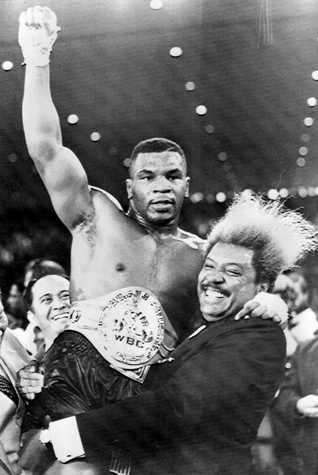 Mike Tyson and Don King after the November 22, 1986 fight with Trevor Berbick that made Tyson the youngest-ever heavyweight champion.