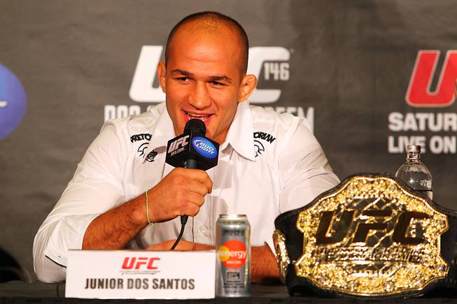 Champion Junior Dos Santos answers a question during a news conference Tuesday, March 27, 2012 to advance the all heavyweight card at UFC 146.