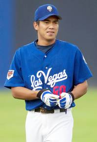 Las Vegas' Chin-Feng Chen warms up before a game against Albuquerque at Cashman Field Monday, July 28, 2003. 