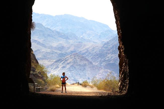 Candace Jones runs through the tunnels to Hoover Dam near Boulder City on Friday, March 30, 2012.