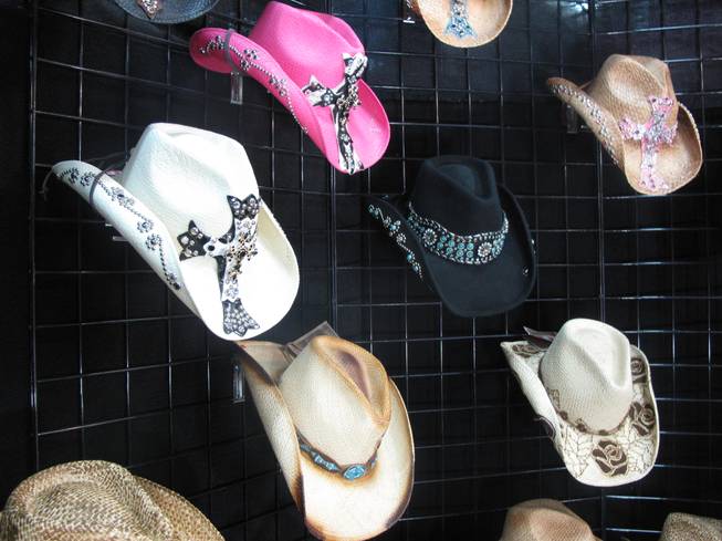 Hats, boots and belts decorated in flashy crystals and elaborate patterns were popular sellers at the Academy of Country Music Experience at Mandalay Bay Saturday. The event, which features shopping, food and country music, runs through Sunday.