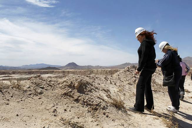 Teacher Cheri Petroni looks over the PABCO Gypsum mine near Lake Mead during an earth science workshop for teachers Wednesday, April 4, 2012. The workshops are sponsored by the Nevada Mining Association and the Nevada Division of Minerals. 