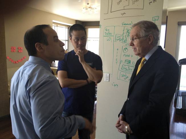 Dr. Zubin Damania, M.D., Tony Hsieh, and U.S. Sen. Harry Reid discuss the health system in Nevada in Hsieh's condo inside The Ogden in downtown Las Vegas.