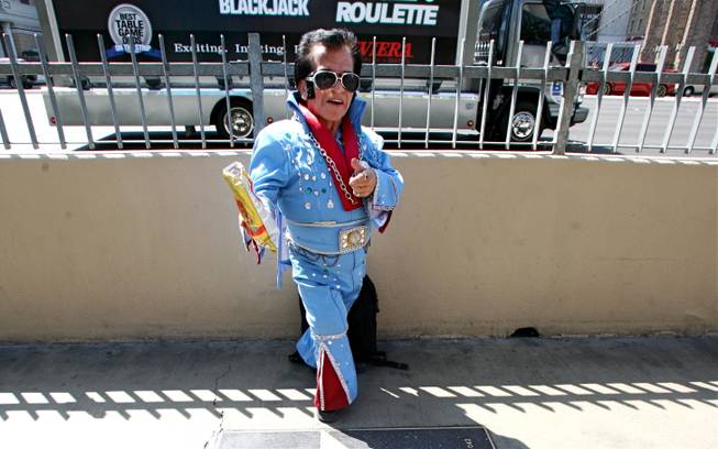 The one and only Tiny Elvis welcomes visitors on the Strip on Saturday, April 7, 2012.