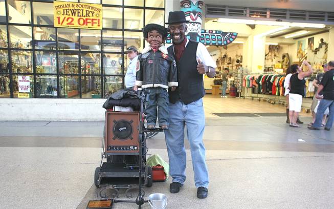 Ventriloquist Scarlet Ray Watt performs at the Fremont Street Experience on Saturday, April 7, 2012.