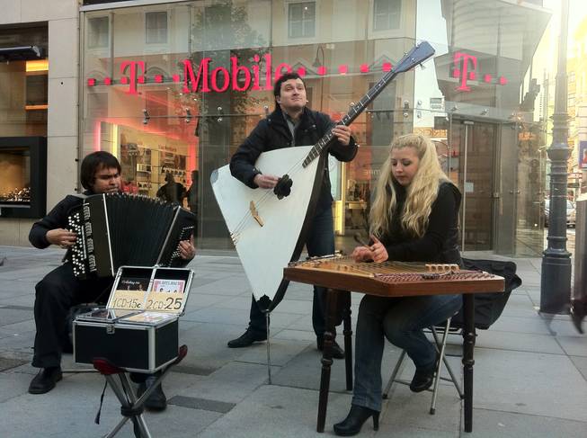 The Vienna folk act Artlang Trio, rockin' it for tips.