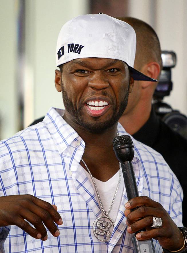 Rapper Curtis "50 Cent" Jackson attends Floyd Mayweather Jr.'s media workout Tuesday, April 24, 2012. Mayweather will challenge Miguel Cotto of Puerto Rico for Cotto's WBA junior middleweight title at the MGM Grand Garden Arena on May 5.