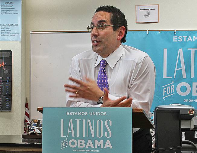 Democratic National Committee senior adviser for Hispanic Affairs Juan Sepulveda addresses the Hispanic Student Union after school at Rancho High School Tuesday, April 24, 2012. Sepulveda trumpeted President Barack Obama's programs to help students pay for college as the president campaigns for Congress to extend a reduced interest rate for federal student loans that is set to expire in July.