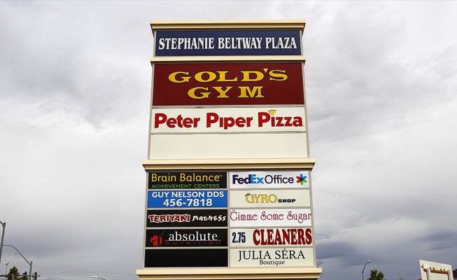 A list of businesses at the Stephanie Beltway Plaza strip mall in Henderson Wednesday, April 25, 2012.  King Putt, an indoor golf and laser tag business, and Lumber Liquidators will be coming to the mall.