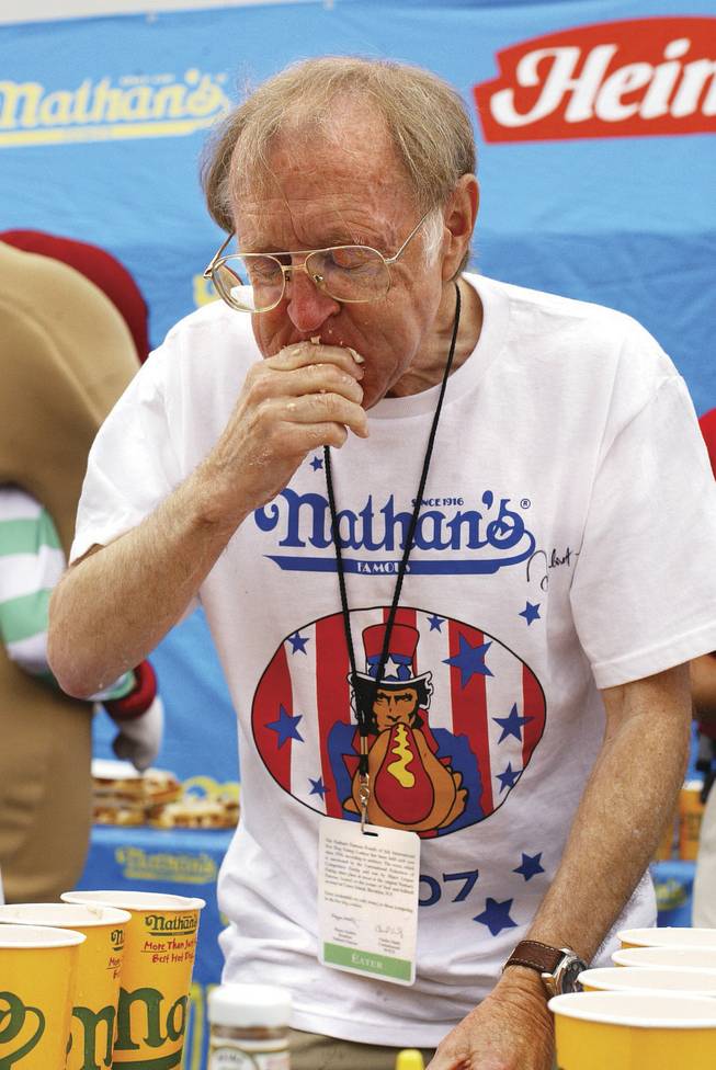Rich LeFevre, of Henderson, competes in the Nathan's Famous Hot Dog eating contest in 2008.