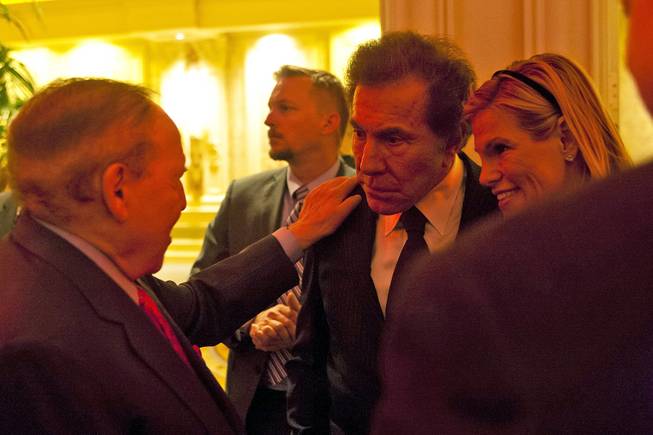 Sheldon Adelson greets Steve Wynn and wife Andrea Hissom at the eighth-annual Vallen Dinner of Distinction on April 26, 2012. Adelson received the Hospitality Industry Leader of the Year award.
