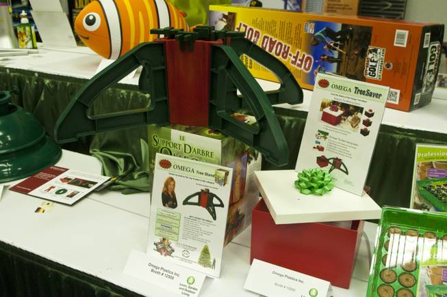 The Omega Tree Saver and Tree Stand, which allows your real Christmas Tree to be watered while on display for the holidays, is shown at the 2012 National Hardware Show in Las Vegas, Wednesday May 2, 2012.