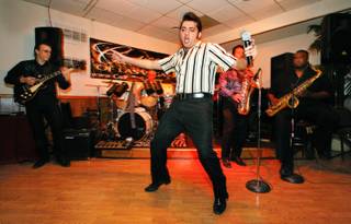 Justin Shandor, and Elvis Presley impersonator, performs the song, 