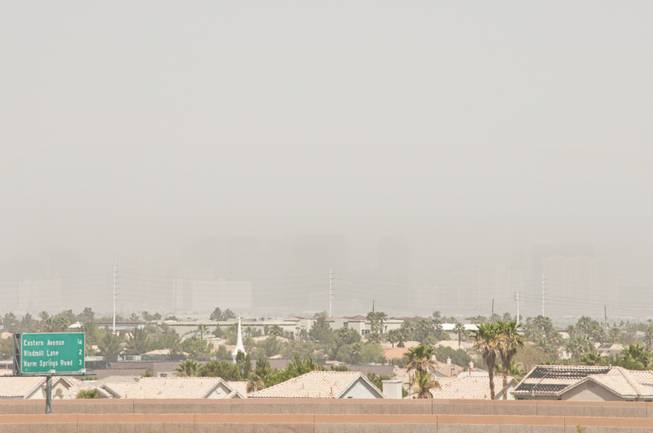 The Las Vegas Strip disappears underneath a brown haze that covers the valley on Thursday, May 10, 2012.