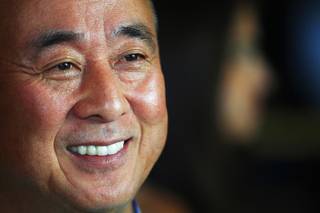 Nobu Matsuhisa talks with guests during a preview of his new restaurant and hotel in Caesars Friday, May 11, 2012.