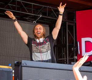 DJ David Guetta performs at Encore Beach Club in the Encore on Sunday, May 27, 2012. The crowd included DJ Tiesto, Lil Jon, Reggie Bush and Adrianna Costa.