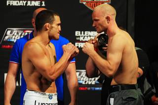 Jake Ellenberger, left, and Martin Kampmann face off during the weigh in for The Ultimate Fighter 15 Thursday, May 31, 2012.