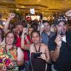 Fans of boxer and Filipino congressman Manny Pacquiao chant his name as he arrives at the MGM Grand Tuesday, June 5, 2012. Pacquiao will defend his WBO welterweight title against undefeated boxer Timothy Bradley Jr. at the MGM Grand Garden Arena Saturday.