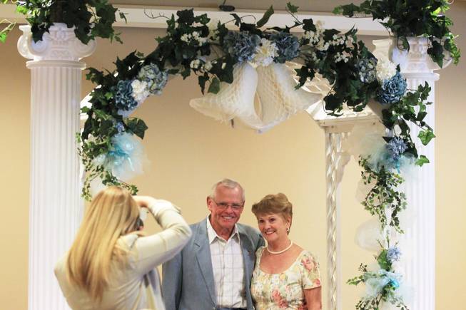 Jerry and Kay Harmon, married for 52 years, pose for a photo during a wedding vow renewal ceremony at Las Ventanas Wednesday, June 6, 2012.