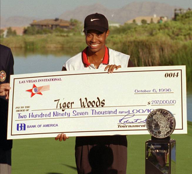 Tiger Woods smiles after winning the 1996 Las Vegas Invitational, which was his first victory on the PGA Tour.