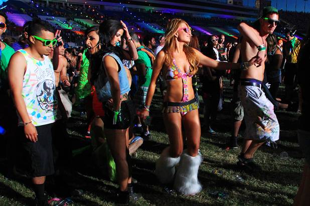Festival goers fill the infield in front of the Cosmic Meadow stage during the first night of the Electric Daisy Carnival early Saturday, June 9, 2012 at the Las Vegas Motor Speedway.