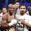 Timothy Bradley Jr. (L) of the U.S. poses with Manny Pacquiao of the Philippines after their title fight at the MGM Grand Garden Arena in Las Vegas, Nevada June 9, 2012. Bradley took Pacquiao's WBO welterweight title by split decision.  