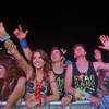 Tracey Crane, 18, of Chico, Calif. and brothers Tom, center, and Ed Sharp, 19, of Pebble Beach, Calif. listen to electronic dance music at the kinetic FIELD during the final night of the Electric Daisy Carnival at the Las Vegas Motor Speedway Sunday night/Monday morning June 11, 2012.
