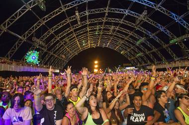 Festivalgoers listen to electronic dance music at the Circuit Grounds stage during the final night of the Electric Daisy Carnival at Las Vegas Motor Speedway on Sunday, June 10, 2012.