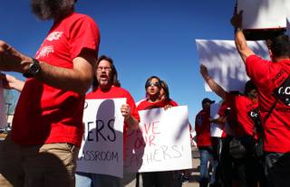Teachers rally during a protest organized by the Clark County Education Association on Monday, June 11, 2012, outside the Clark County School District Administration building on West Sahara Avenue in Las Vegas.