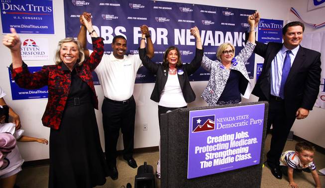 Candidates Dina Titus, from left, Steven Horsford, Rep. Shelley Berkley D-Nev., Nevada State Democratic Party chair Roberta Lange, and John Oceguera pose for a photo during a primary election night party at the new Nevada Democratic Party Field Office in Henderson on Tuesday, June 12, 2012.