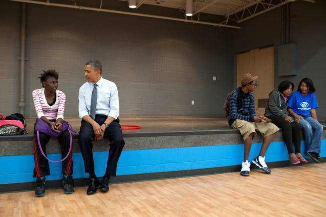 June 14, 2012."We made an OTR (off-the-record, surprise stop) at the Boys and Girls Clubs of Cleveland after a campaign event, and the President sat and talked to a young woman before shooting hoops with another group of kids."