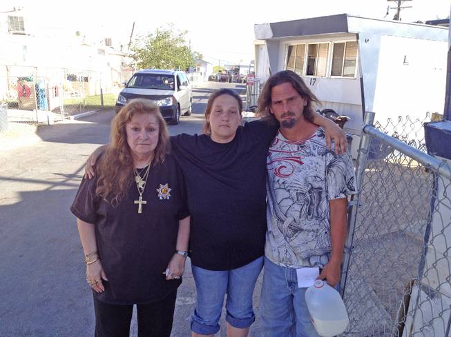 From left, residents Helen Miller, Sheilla Robbins and Robert Hicks are shown at the Van’s Trailer Oasis mobile home park on Las Vegas Boulevard North near Lamb Boulevard.