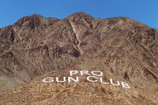 The Desert Hills Shooting Club sign is seen from the road in Boulder City on Thursday, June 21, 2012.