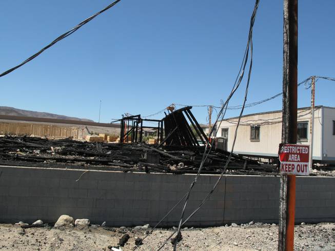 Signs and poles near Wigwam Street were scorched by an early morning fire at an apartment construction site. Fire crews responded to an early morning fire at 1131 Wigwam St., the future site of Theory Apartments on Wednesday , June 20, 2012.Yasmina Chavez