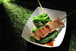 A dish of grilled Kurobata pork cheeks from Raku is seen at the Las Vegas incarnation of the Lucky Rice food festival Saturday, June 23, 2012, at the Cosmopolitan.