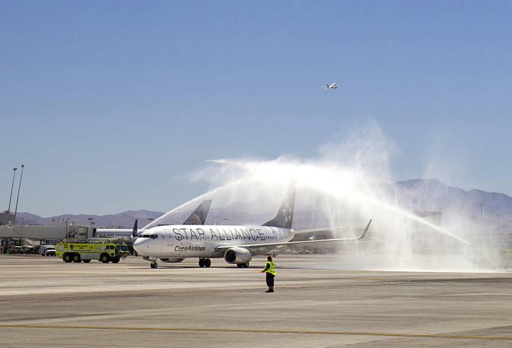 A Copa Airlines passenger jet from Panama City, Panama receives a water cannon welcome as it arrives on it's inaugural flight to Las Vegas at the new Terminal 3 at McCarran International Airport Wednesday, June 27, 2012. The Copa Airlines service is the first direct flight from Central or South America to Las Vegas, said airport spokesman Chris Jones.