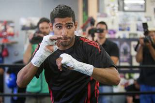 Former WBA and IBF super lightweight champion Amir Khan of Britain shadow boxes during a workout at the Wild Card Boxing Club in Hollywood, Calif. Tuesday, July 3, 2012. Khan is preparing to challenge the undefeated WBC super lightweight champion Danny Garcia for the title at the Mandalay Bay Events Center on July 14.