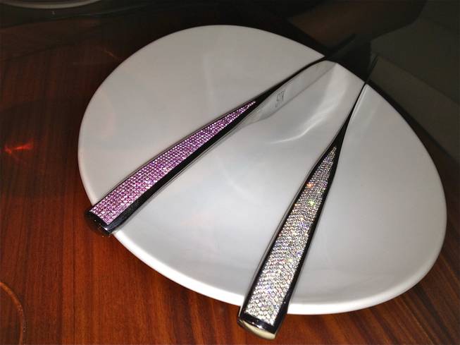 Jason of Beverly Hills unveiled a new steak knife covered in sapphires for VIPs dining at the STK steakhouse at the Cosmopolitan in Las Vegas. The knife was unveiled July 2, 2012. It joined a diamond covered knife, also designed by Jason of Beverly Hills, to create a his-and-hers set for the restaurant.
