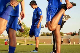 Ruben Duran, center and members of Players SC 94 stretch before practice at the Kellogg-Zaher Soccer Complex near Buffalo and Washington in Summerlin Monday, July 10, 2012. Players SC 94, a youth soccer team of recent high school graduates training for US Nationals, won the regionals in June to become the first Nevada team to advance to regionals.