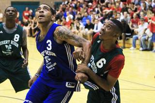 Anthony Marshall and DaQuan Cook fight for a rebound during the Desert Reign summer league Tuesday, July 10, 2012.