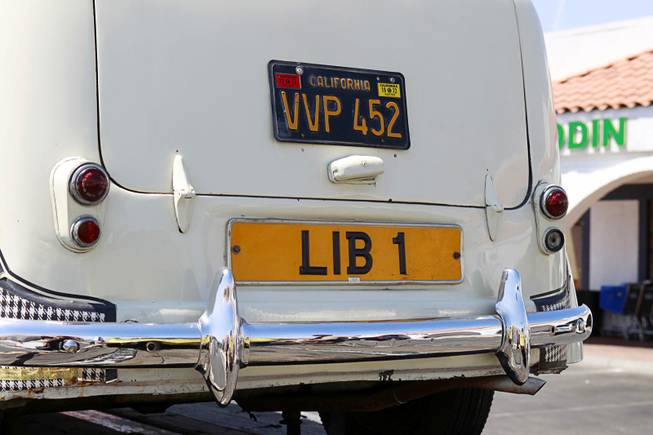 A London taxi with "Lib 1" plates is shown in the Liberace Museum parking lot Wednesday July 11, 2012. Two cars, a 1972 custom Bradley GT and the 1957 London taxi, are on loan to HBO for a project called "Behind the Candelabra," a spokesperson said.