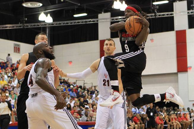 Houston Rockets guard Courtney Fortson drives to the basket during their NBA Summer League game against the Toronto Raptors Friday, July 13, 2012.