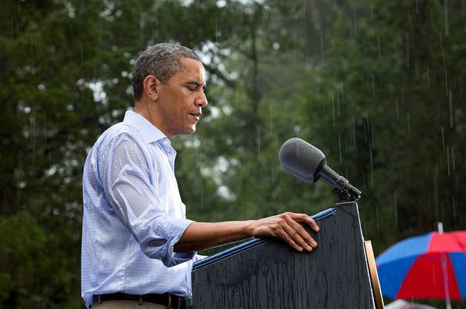 July 14, 2012."The President delivers remarks in the pouring rain at a campaign event in Glen Allen, Va. He was supposed to do a series of press interviews inside before his speech, but since people had been waiting for hours in the rain he did his remarks as soon as he arrived onsite so people."