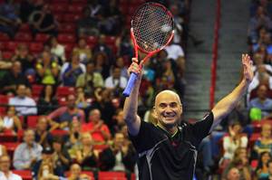Andre Agassi waves to the crowd after defeating Jim Courier during the Las Vegas stop of the 2011 Champions Series Tennis tournament Saturday, Oct. 15, 2011. Agassi won last year's event and will headline this year's tour stop at Mandalay Bay on Nov. 17.