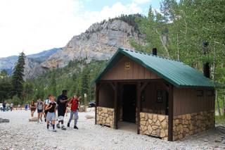 A youth group walks past a new restroom at the Upper Kyle Day Use Area on Mount Charleston Friday, July 20, 2012.