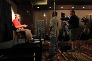 UNLV head football coach Bobby Hauck takes part in the Mountain West Conference football media day Tuesday, July 24, 2012.