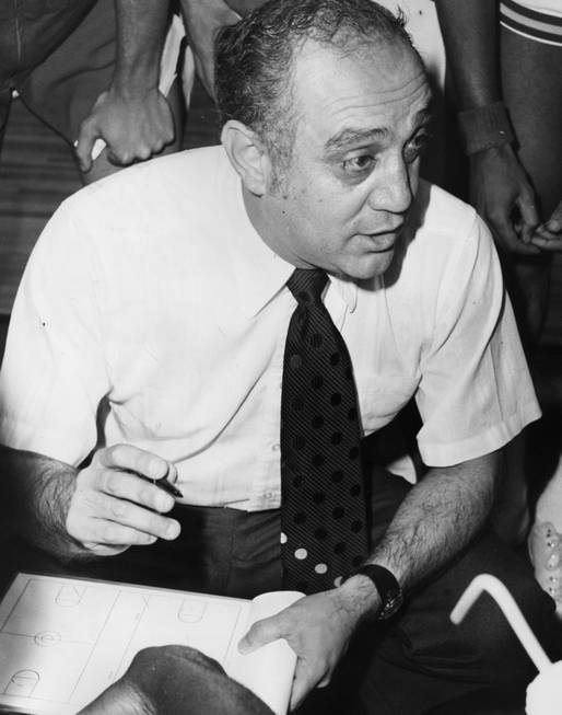 UNLV basketball coach Jerry Tarkanian talks to his players during ...